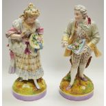 A large pair of German porcelain figures, unmarked, late 19th century,