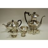 An EPNS four piece tea service; a silver napkin ring; brass jam pan; Great Longstone,