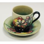 A Moorcroft cup and saucer