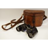 A cased pair of WWI Bausch & Lomb 6x30 Military Stereo Binoculars, original leather carrying case,
