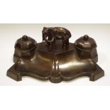 A continental spelter dark patinated inkstand,