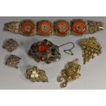 A 19th century silver filigree and red stone bracelet,