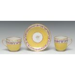 A Derby canary yellow ground teacup, coffee cup and saucer,