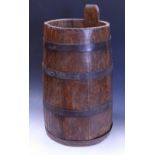 A 19th century coopered oak butter churn, 64cm high.