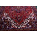 A large rectangular woollen carpet,