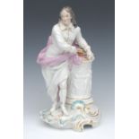 A Derby type figure, Milton, he stands bare headed wearing traditional Puritan dress,