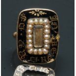 A 19th century mourning ring, central hairwork lattice within a band of eighteen seed pearls,