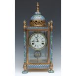 A 20th century brass and cloisonné mantel clock, the 10cm dial with Roman numerals,