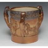 A 19th century salt glazed stoneware ale tyg, in relief with tavern figures,