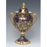A Coalport two handled pedestal urnular vase and cover,