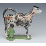 A 19th century cow creamer and cover, standing four square, with milkmaid,