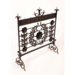 A large Arts and Crafts wrought iron country house firescreen,