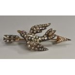 An Edwardian bird and arrow diamond sweetheart brooch,