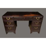 A Chinese hardwood desk, rectangular panel top with three frieze drawers,