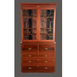 A George III satinwood crossbanded mahogany secretaire bookcase,