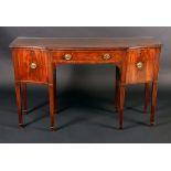 A George III mahogany shaped serpentine sideboard, of small proportions,