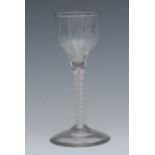 An English cordial glass, bucket shaped bowl, cotton twist stem, spreading circular base, 14cm high,