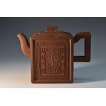 A Chinese rectangular Yixing teapot and cover,