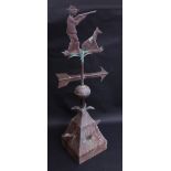 A 19th century style copper weather vane, the finial depicting a sportsman and his dog,