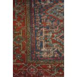 A Middle Eastern hand woven carpet,