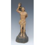 A North European polychrome and gesso softwood carving, of St Sebastian, 30cm high,