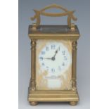 A late 20th century brass carriage clock, blue Arabic numerals, inscribed Wales & McCulloch,