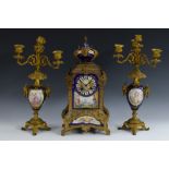 A 19th century porcelain mounted gilt clock garniture,