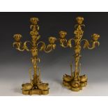 A pair of 19th century gilt bronze three-light candelabra,