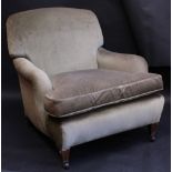 A late Victorian wide armchair, olive upholstery, stamped W.B.