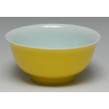 A Chinese yellow monochrome bowl, quite plain, flared rim, 11.