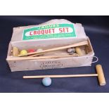 A Jaques London croquet set, manufactured by John Jaques & Son, Thornton Heath, Surrey,