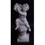 An 18th century style composition garden statue, of a scantily clad putto playing a tambourine,