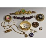 Jewellery - a 19th century gilt metal embossed floral jade and pink glass inset bracelet;