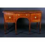 A George III rosewood crossbanded mahogany bow fronted sideboard,