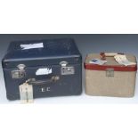 A mid 20th century travelling case, with paper label,