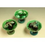 A pair of 19th century Chinese celadon and aubergine glaze footed bowls,