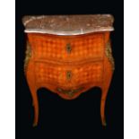 A French Transitional style gilt metal mounted mahogany,