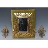 A late Victorian style brass green velvet double sconce hall mirror, bevelled rectangular plate,