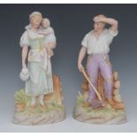 A pair of Gebruder Heubach bisque porcelain figures, of a famer and wife, he with an axe,