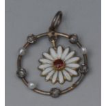 A circular diamond, seed pearl, ruby and white enamel floral pendant,