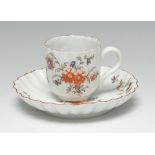 An early Derby lobed coffee cup and saucer,