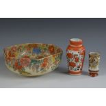 A Japanese satsuma hexagonal bowl, profusely decorated in polychrome with dense flowers, 14cm diam,