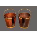 A near pair of George III Irish brass bound mahogany plate buckets,