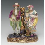 A rare Minton figural candlestick or taper holder,