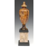 An early 19th century Blue John pedestal urn, integrated cover, ball finial, Five vein,