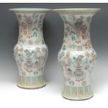 A pair of Chinese yen-yen vases, painted in polychrome with a profusion of precious objects,