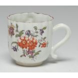 An early Derby ribbed coffee cup,