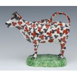 A North of England cow creamer, standing four square,