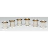 A set of six sterling silver whisky tots or stirrup cups, 3.