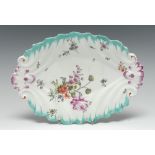 An early Derby silver-shape dish, painted in polychrome enamels with country flowers,